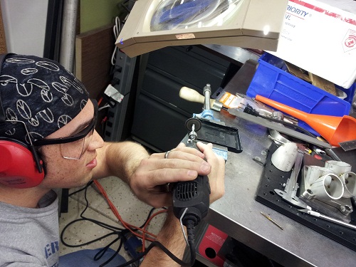 Erik Arentzen machining a case for the tuxgraphics smartphone garage door operner